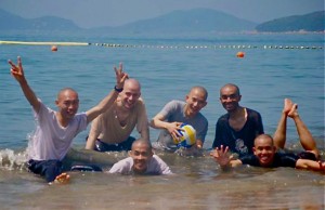 monks swimming